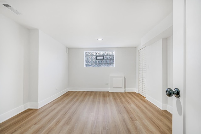5823 S Francisco Ave, Chicago, IL 60629 - unfurnished room with light wood-style flooring, baseboards, and recessed lighting