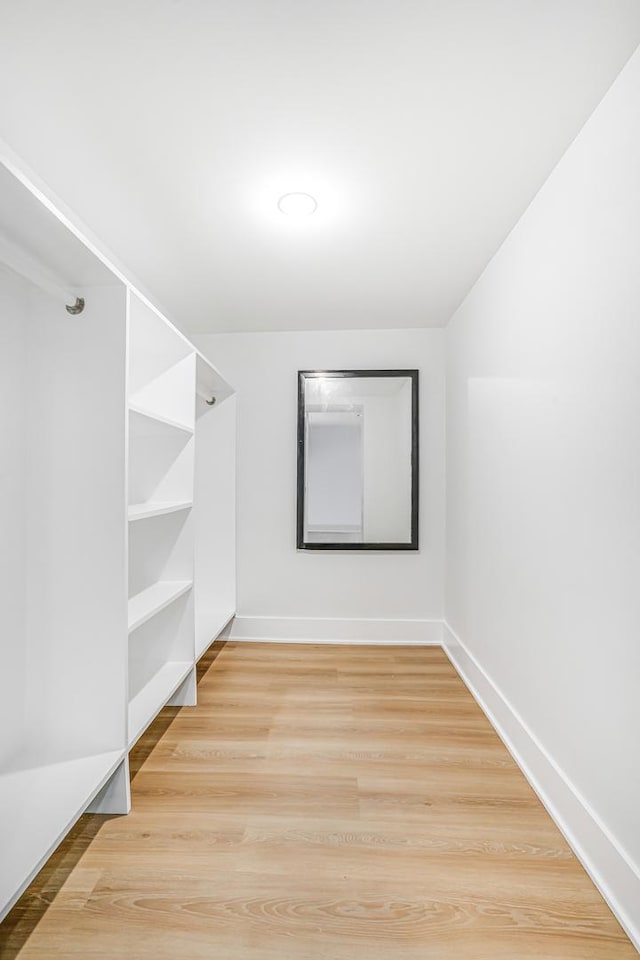 5823 S Francisco Ave, Chicago, IL 60629 - walk in closet featuring wood finished floors
