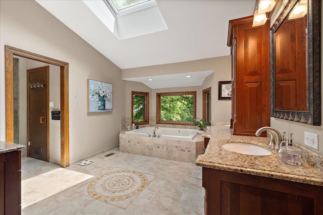 10348 Woburn Ct, Orland Park, IL 60462 - bathroom featuring vanity, a skylight, lofted ceiling, a bath, and tile patterned flooring