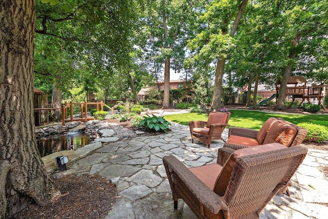 10348 Woburn Ct, Orland Park, IL 60462 - fenced backyard with a playground and a patio area