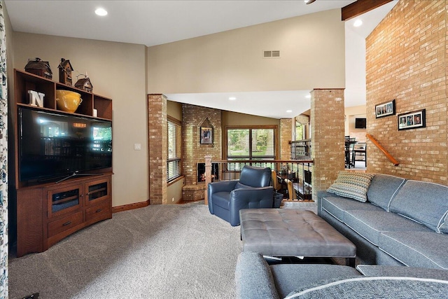 10348 Woburn Ct, Orland Park, IL 60462 - living area with brick wall, carpet flooring, high vaulted ceiling, recessed lighting, and a fireplace