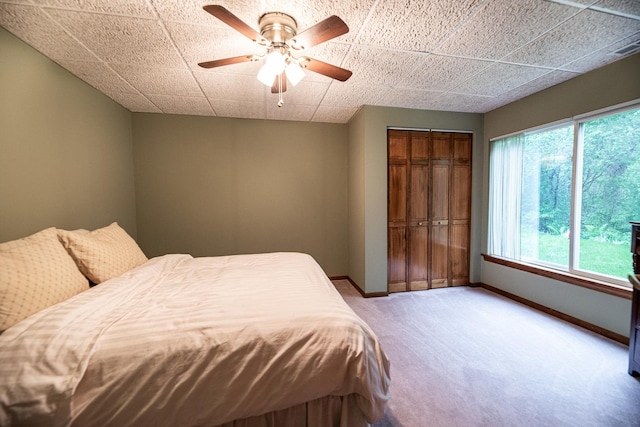 1027 Fairway Dr, Fox Lake, IL 60020 - bedroom with light colored carpet, baseboards, a ceiling fan, and a closet