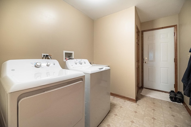 1027 Fairway Dr, Fox Lake, IL 60020 - laundry room with separate washer and dryer, light floors, and baseboards