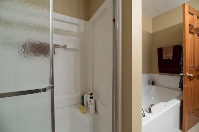 1027 Fairway Dr, Fox Lake, IL 60020 - bathroom with a garden tub and a stall shower