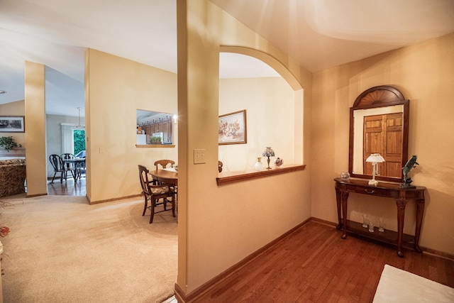 1027 Fairway Dr, Fox Lake, IL 60020 - corridor with baseboards, wood finished floors, and arched walkways