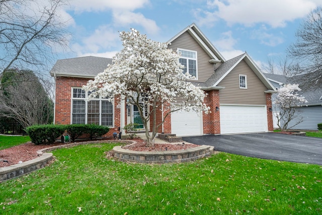 2008 Snow Creek Rd, Naperville, IL 60564 - traditional home with brick siding, asphalt driveway, and a front yard