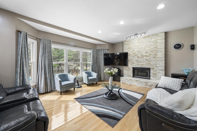 2008 Snow Creek Rd, Naperville, IL 60564 - living area with wood finished floors, rail lighting, a fireplace, and recessed lighting
