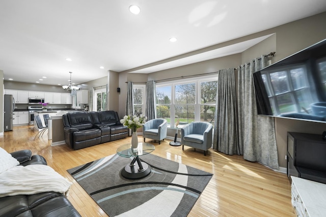 2008 Snow Creek Rd, Naperville, IL 60564 - living area with a chandelier, recessed lighting, and light wood-type flooring