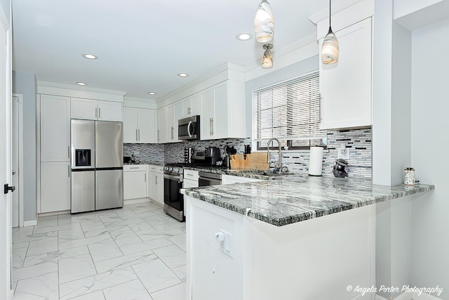 638 Dordan Ct, Gurnee, IL 60031 - kitchen featuring appliances with stainless steel finishes, stone countertops, light marble finish flooring, a peninsula, and recessed lighting