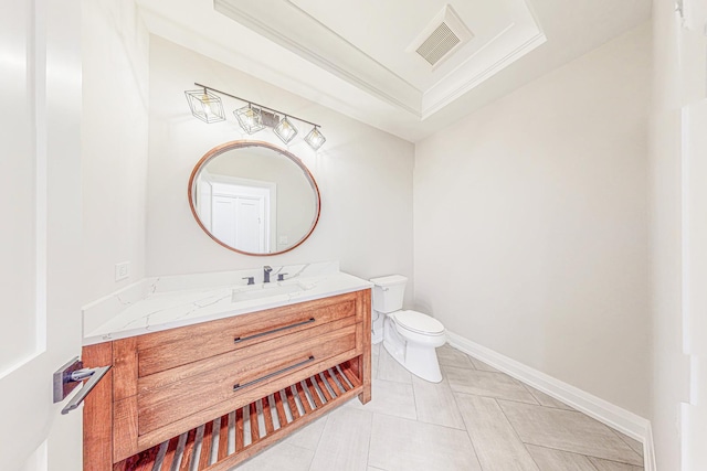1326 N Race Ave, Arlington Heights, IL 60004 - bathroom featuring toilet, vanity, tile patterned floors, a raised ceiling, and baseboards