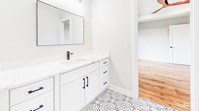 1326 N Race Ave, Arlington Heights, IL 60004 - bathroom featuring vanity, baseboards, and recessed lighting