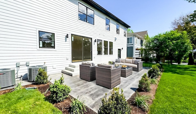 1326 N Race Ave, Arlington Heights, IL 60004 - back of house with an outdoor living space, central AC unit, a patio, and a lawn
