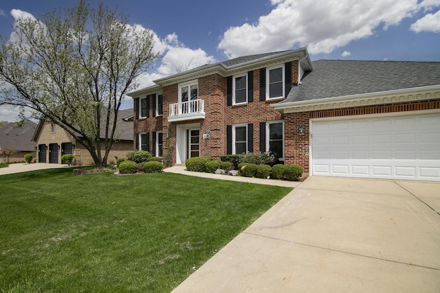 454 Hemlock Ln, Roselle, IL 60172 - colonial home with a balcony, a front yard, brick siding, and concrete driveway