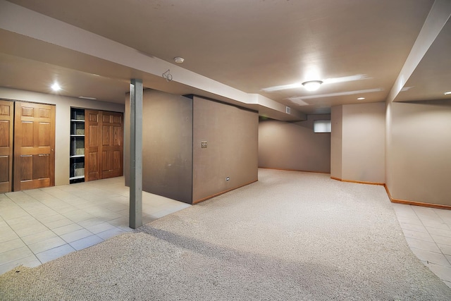 454 Hemlock Ln, Roselle, IL 60172 - finished basement with light tile patterned flooring, light carpet, and baseboards