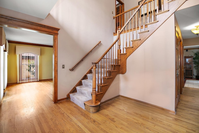 454 Hemlock Ln, Roselle, IL 60172 - stairway featuring wood finished floors and baseboards