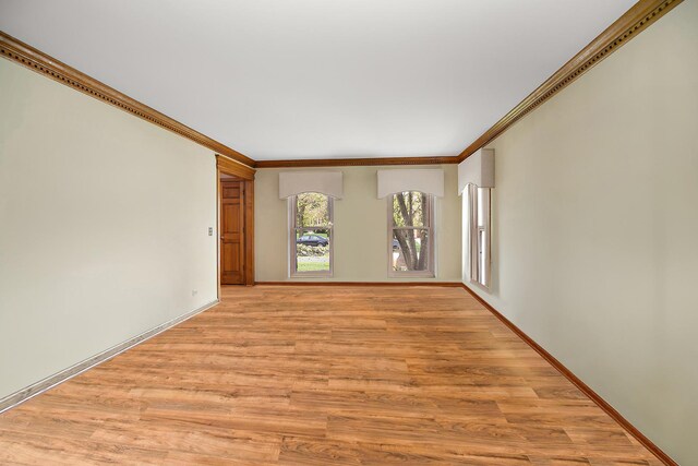 454 Hemlock Ln, Roselle, IL 60172 - unfurnished room with light wood-type flooring, crown molding, and baseboards
