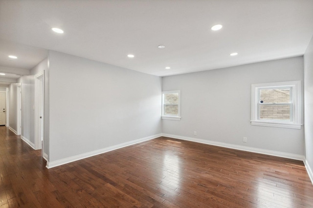 8019 S Bishop St, Chicago, IL 60620 - unfurnished room featuring dark wood-style floors, baseboards, and recessed lighting