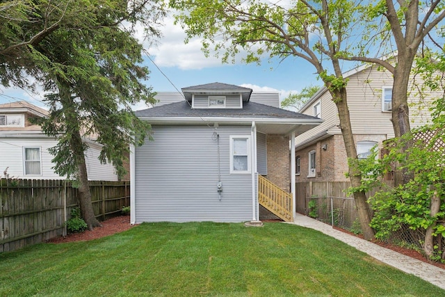 8019 S Bishop St, Chicago, IL 60620 - back of property with a shingled roof