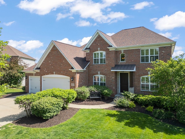 12923 Grande Pines Blvd, Plainfield, IL 60585 - colonial home with brick siding and a shingled roof