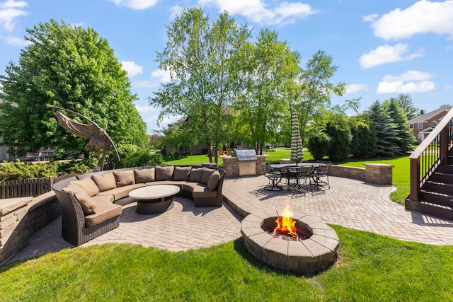 12923 Grande Pines Blvd, Plainfield, IL 60585 - view of patio / terrace featuring exterior kitchen, an outdoor living space with a fire pit, and outdoor dining space