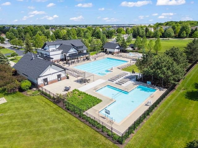12923 Grande Pines Blvd, Plainfield, IL 60585 - drone / aerial view of a pool and a tree filled landscape