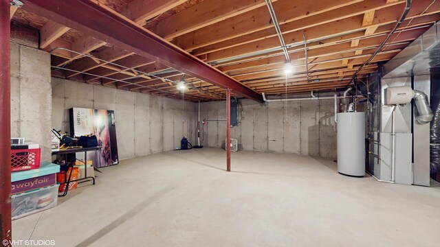 296 Huron St, Vernon Hills, IL 60061 - unfinished below grade area featuring water heater, heating unit, and electric panel