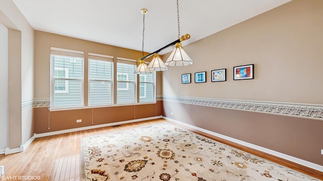 296 Huron St, Vernon Hills, IL 60061 - spare room featuring wood finished floors and baseboards