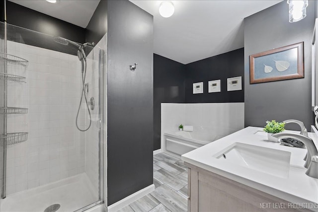 1839 Tamahawk Ln, Naperville, IL 60564 - bathroom featuring a shower stall, vanity, baseboards, and a bath