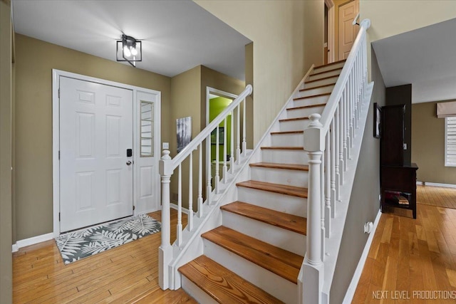 1839 Tamahawk Ln, Naperville, IL 60564 - foyer with wood-type flooring, baseboards, and stairway
