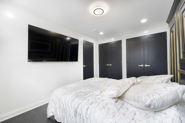 6964 W Diversey Ave Unit 6, Chicago, IL 60707 - bedroom featuring baseboards, multiple closets, dark wood-style floors, crown molding, and recessed lighting