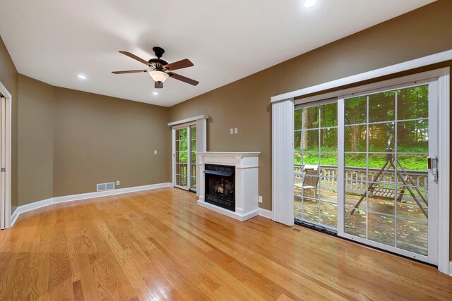 1912 Indian Trl, Kankakee, IL 60901 - unfurnished living room featuring ceiling fan, light wood finished floors, a fireplace, recessed lighting, and baseboards