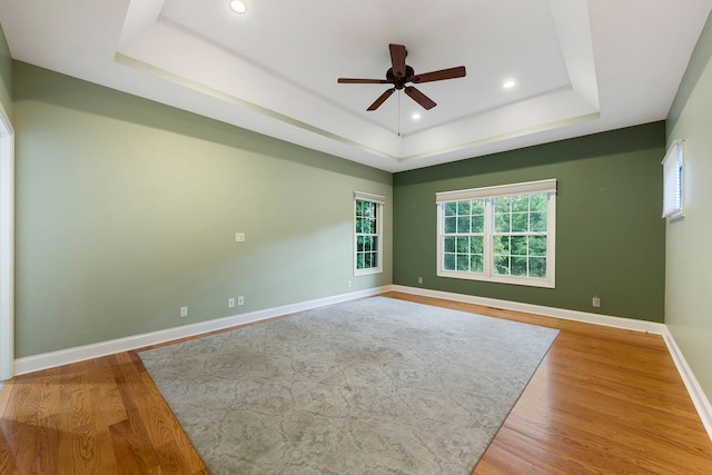 1912 Indian Trl, Kankakee, IL 60901 - spare room featuring a raised ceiling, a ceiling fan, wood finished floors, baseboards, and recessed lighting