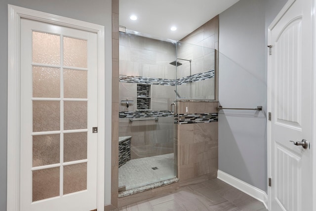1912 Indian Trl, Kankakee, IL 60901 - full bathroom with a stall shower, recessed lighting, and baseboards