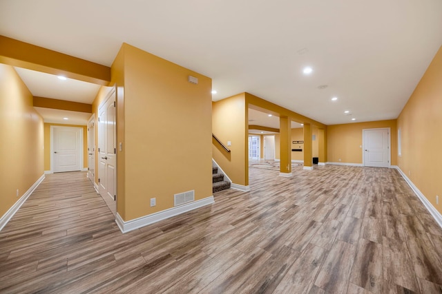 1912 Indian Trl, Kankakee, IL 60901 - unfurnished living room with wood finished floors, stairs, recessed lighting, and baseboards
