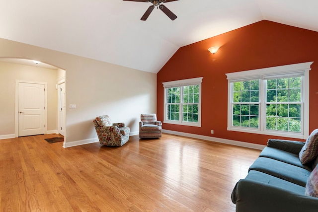 1912 Indian Trl, Kankakee, IL 60901 - living area featuring arched walkways, ceiling fan, light wood-style floors, lofted ceiling, and baseboards