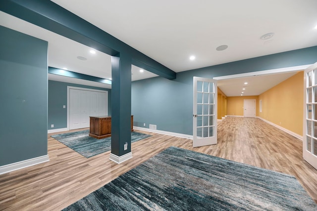 1912 Indian Trl, Kankakee, IL 60901 - unfurnished living room featuring wood finished floors, french doors, baseboards, and recessed lighting
