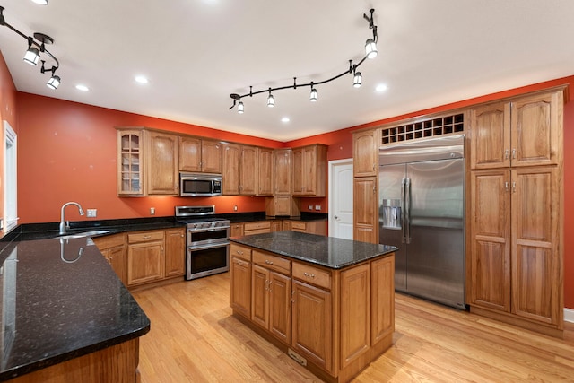 1912 Indian Trl, Kankakee, IL 60901 - kitchen with stainless steel appliances, a sink, light wood-style floors, a center island, and recessed lighting