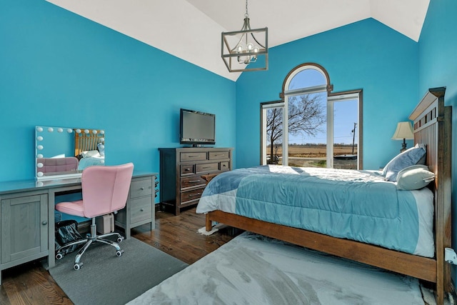 10739 E 3200 N Rd, Blackstone, IL 61313 - bedroom with a chandelier, high vaulted ceiling, a desk, and dark wood-type flooring