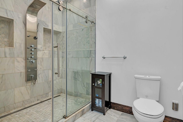 10739 E 3200 N Rd, Blackstone, IL 61313 - bathroom with a stall shower, toilet, and baseboards