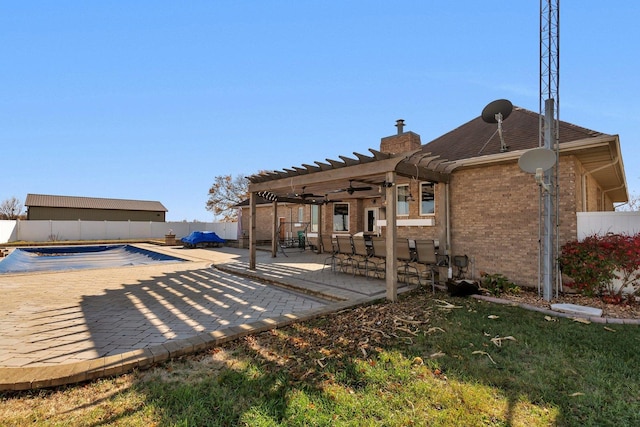 10739 E 3200 N Rd, Blackstone, IL 61313 - fenced backyard featuring ceiling fan, a pergola, and a patio area