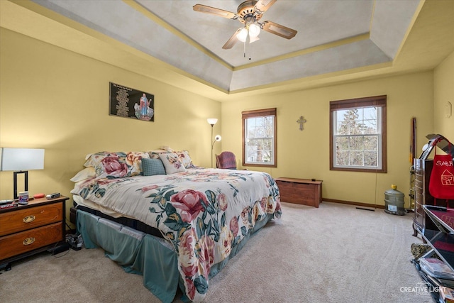 1359 Pine St, Batavia, IL 60510 - carpeted bedroom with a raised ceiling, baseboards, and ceiling fan