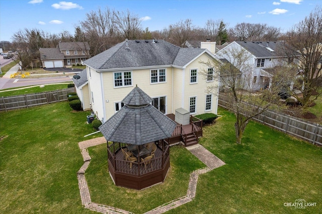 1359 Pine St, Batavia, IL 60510 - rear view of house with a gazebo, a chimney, a wooden deck, and a shingled roof