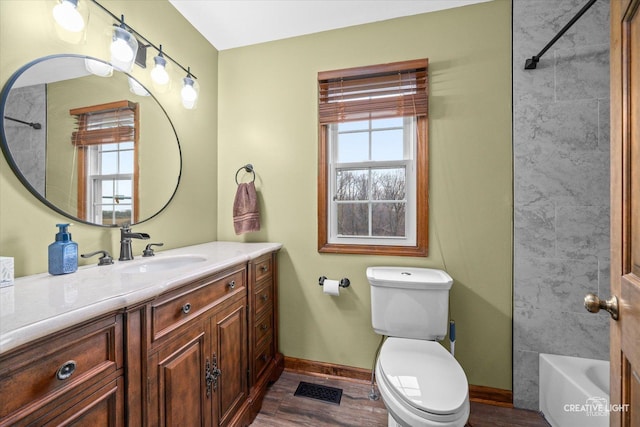 1359 Pine St, Batavia, IL 60510 - full bathroom with vanity, toilet, baseboards, wood finished floors, and shower / bath combination