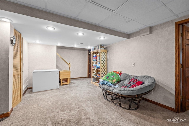1359 Pine St, Batavia, IL 60510 - living area featuring a textured wall, carpet, baseboards, and a drop ceiling