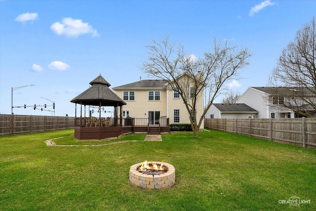 1359 Pine St, Batavia, IL 60510 - back of property with a gazebo, a fire pit, a wooden deck, and a chimney