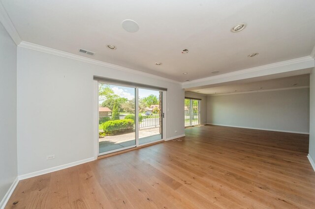 3950 Dundee Rd Unit 101, Northbrook, IL 60062 - unfurnished room featuring ornamental molding, baseboards, light wood finished floors, and recessed lighting