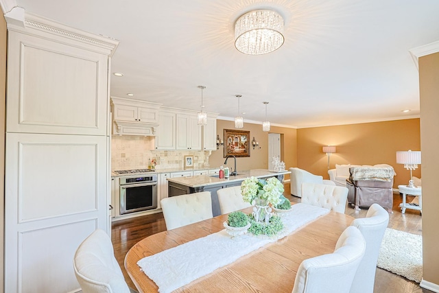 1730 Napoleon Dr, Naperville, IL 60565 - dining space with crown molding, wood finished floors, a chandelier, and recessed lighting