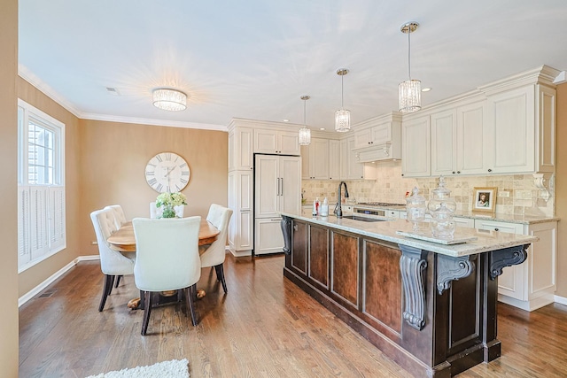 1730 Napoleon Dr, Naperville, IL 60565 - kitchen featuring decorative backsplash, dark wood-type flooring, a sink, baseboards, and ornamental molding