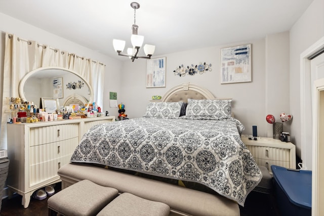 4331 S Evans Ave, Chicago, IL 60653 - bedroom with a chandelier and wood finished floors