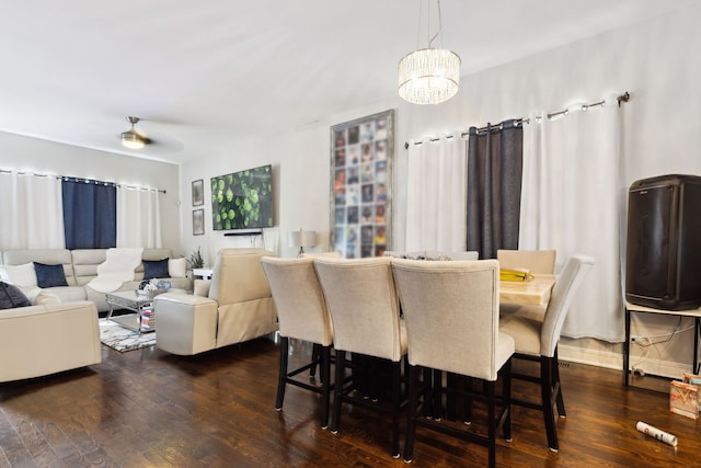 4331 S Evans Ave, Chicago, IL 60653 - dining space featuring dark wood-style floors, a chandelier, and a ceiling fan